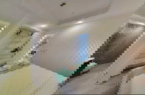 Foto 9 - BlueNook Suites