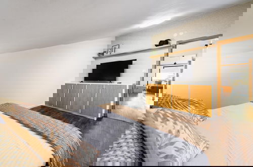 Foto 5 - Sunset Suite Premium Apartment