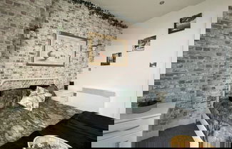 Foto 3 - Stylish City Center 2 BR Retreat