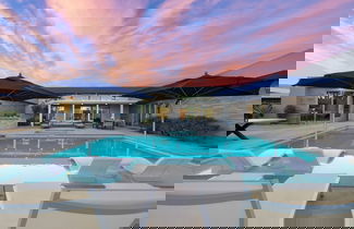 Photo 1 - Polo Villa 10 by Avantstay Backyard Oasis w Putting Green 260320 6 Bedrooms