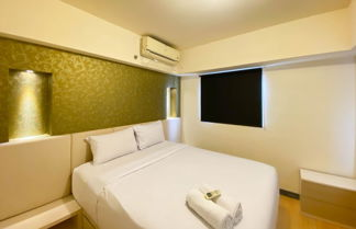 Foto 2 - Cozy And Modern Look 2Br The Wave Kuningan Apartment