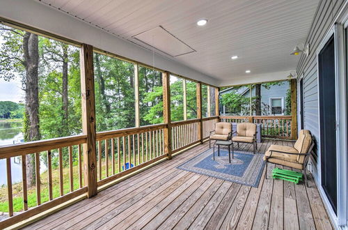 Photo 13 - Relaxing Riverfront Cottage w/ Boat Dock