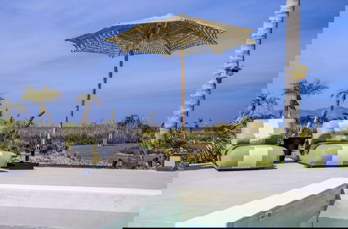 Foto 32 - TAF Beach Villas with Tesla