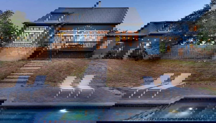 Photo 1 - Luxurious Lake Park House: Sleeps 25, Pool, Hot-tub, Firepit and Game Room!