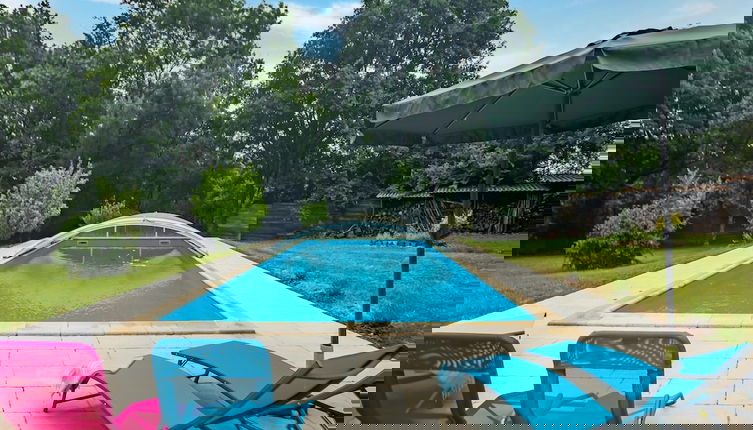 Foto 1 - Holiday Home With Roofed Swimming Pool