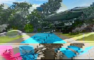 Foto 1 - Holiday Home With Roofed Swimming Pool
