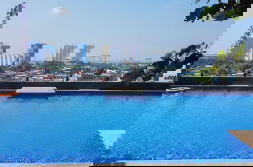 Foto 12 - Best Deal And Homey Studio Apartment Tree Park City Cikokol