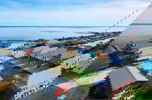 Photo 73 - 2 Homes, Sleeps 16, Shared Pool+boat Dock Laguna Village Serenity by Avantstay
