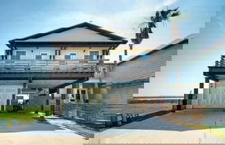 Foto 3 - Waterfront View of Nature Preserve + Birdwatching Sunset Hideaway by Avantstay