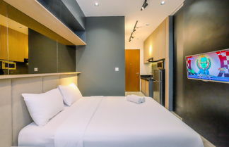 Foto 3 - Minimalist And Comfy Studio Ciputra World 2 Apartment