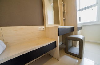 Photo 2 - Homey Apartment at Parahyangan Residence near Parahyangan University