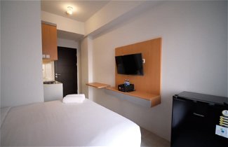 Photo 2 - Tidy And Cozy Stay Studio Apartment At Suncity Residence