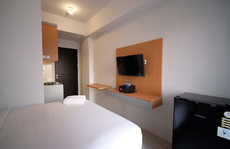 Foto 2 - Tidy And Cozy Stay Studio Apartment At Suncity Residence