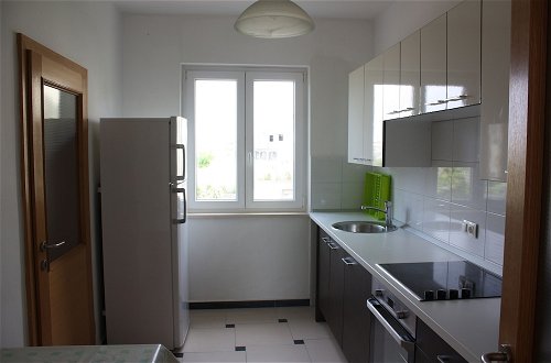 Foto 10 - Pintar Apartment