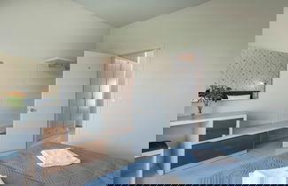 Foto 13 - Esplanade Apartments