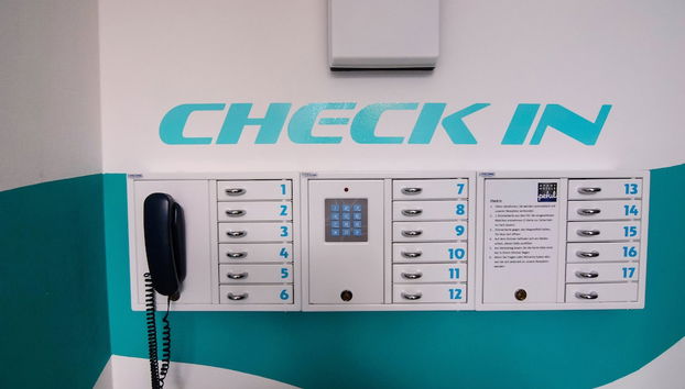 Check-in/check-out kiosk