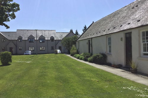 Photo 16 - Inverness Apartments - Courtyard