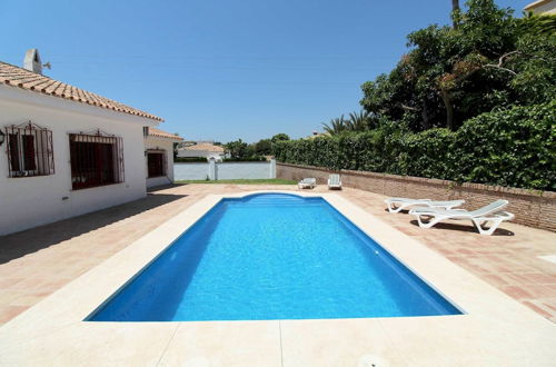 Photo 20 - Villa Maria. Barbacoa piscina y jardín