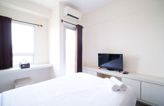 Photo 1 - Nice And Homey Studio At Puri Mas Apartment