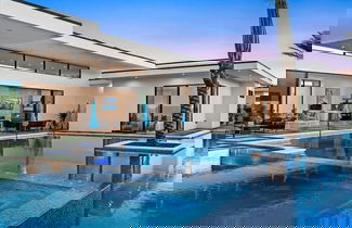 Photo 1 - Exclusive Stay w/ Pool, Hot Tub, Putting Green, Fire Pit Bravo by Avantstay