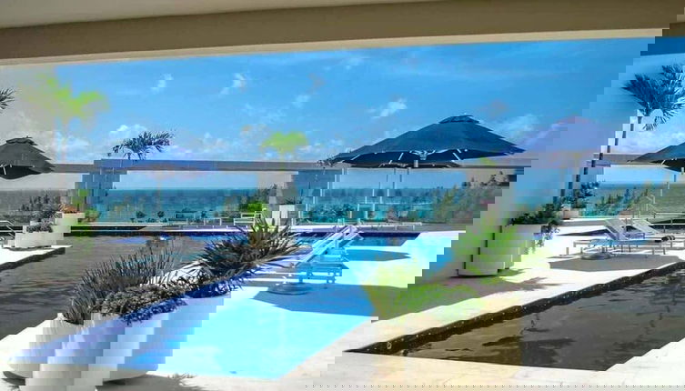Foto 1 - 1 Br. Steps From the Beach Roof W/ocean View
