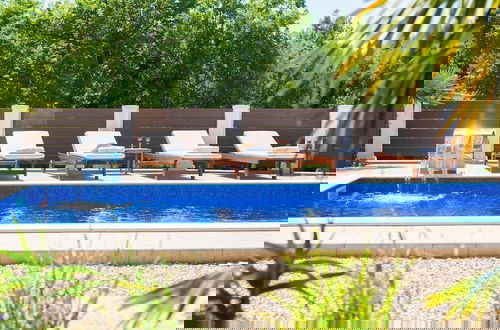 Photo 53 - Tranquil Getaway Polje Villa With Pool