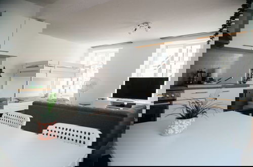 Foto 3 - Nimbuzzz Apartments
