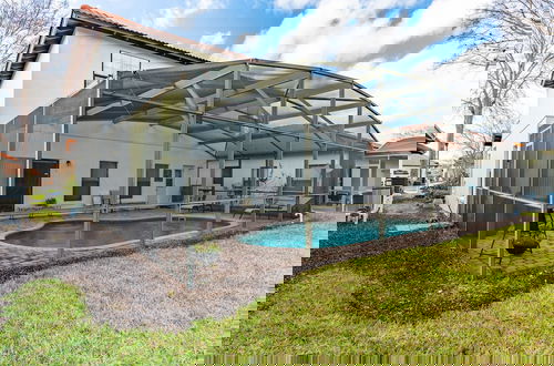 Foto 42 - Poolside Serenity Near Disney World 4 Bedroom Home by RedAwning