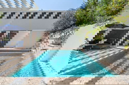 Foto 1 - Rosemary Bluegrass by Avantstay LUX Downtown Rosemary Private Pool