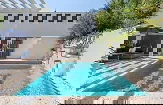 Foto 1 - Rosemary Bluegrass by Avantstay LUX Downtown Rosemary Private Pool