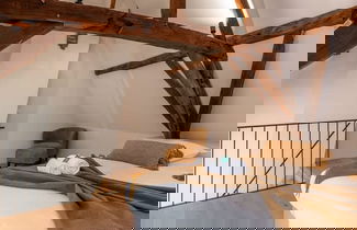Foto 3 - City-view Loft With Wooden Beams and Mezzanine