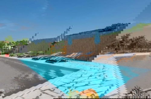 Photo 13 - Adorable Holiday Home With Swimming Pool