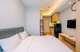 Photo 2 - Cozy Studio Room At Grand Kamala Lagoon Apartment