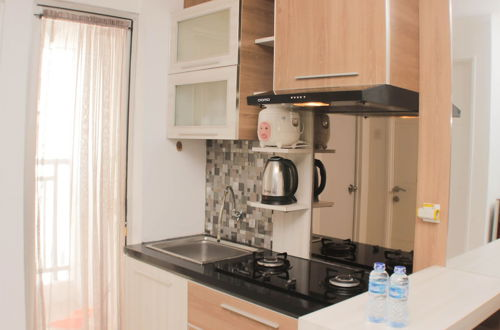 Photo 7 - Comfy And Tranquil 2Br Bassura City Apartment Near Mall