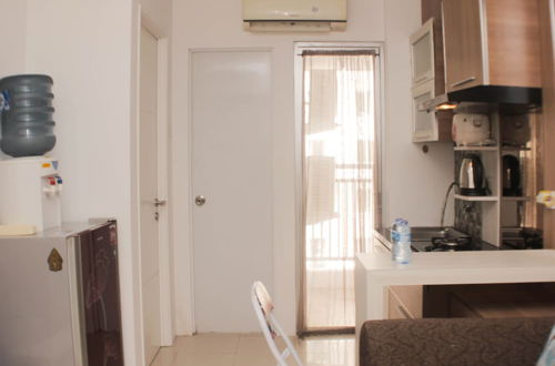 Photo 8 - Comfy And Tranquil 2Br Bassura City Apartment Near Mall