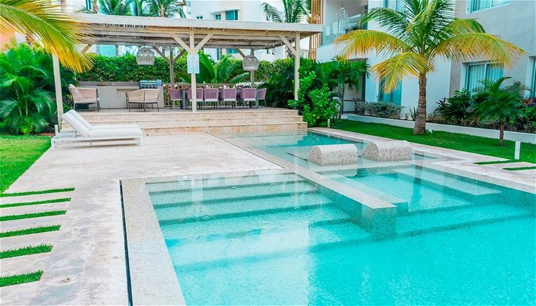 Photo 1 - Affordable Luxury Condo Steps Away From the Beach