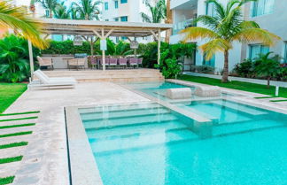 Photo 1 - Affordable Luxury Condo Steps Away From the Beach