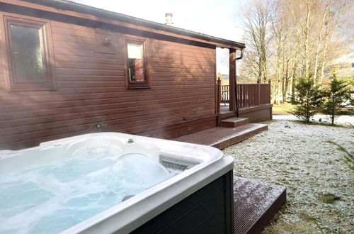 Photo 1 - Stunning 4-bedroom Cabin With Hot Tub in Beattock