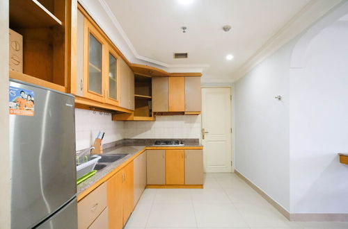 Photo 10 - Homey 2Br With Extra Room At Taman Beverly Apartment