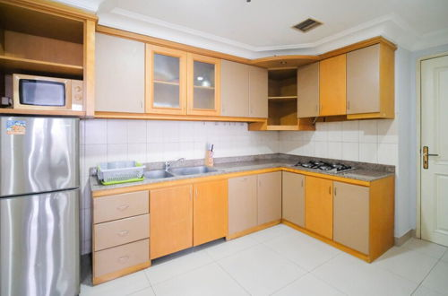 Foto 9 - Homey 2Br With Extra Room At Taman Beverly Apartment