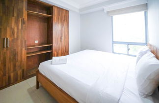 Photo 2 - Homey 2Br With Extra Room At Taman Beverly Apartment