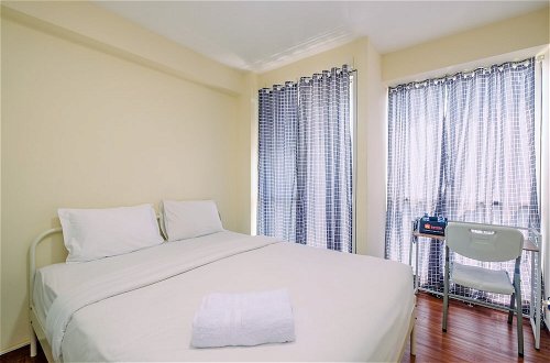 Photo 3 - Homey And Cozy Living Studio Room At Tifolia Apartment