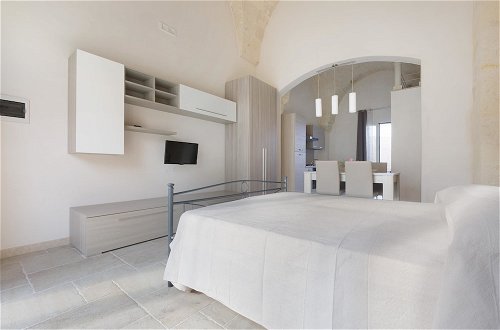 Foto 21 - San Pancrazio Suite Apartments