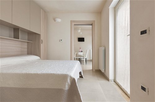 Foto 8 - San Pancrazio Suite Apartments