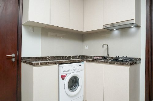 Photo 12 - Minimalist 3BR Apartment at Puri Mansion
