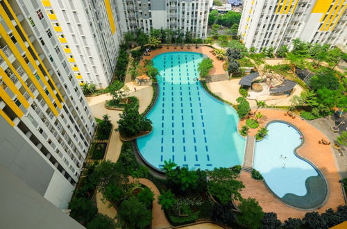 Photo 16 - Deluxe Studio Apartment @ Springlake Summarecon