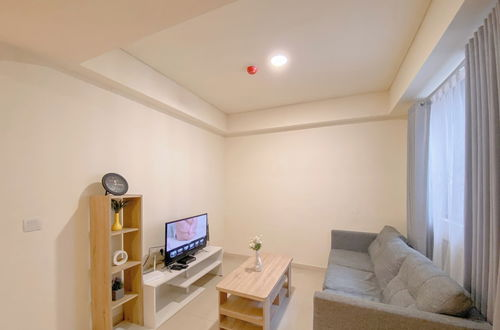 Photo 1 - Modern 2BR Room at Meikarta Apartment By Travelio