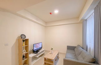 Foto 1 - Modern 2BR Room at Meikarta Apartment By Travelio