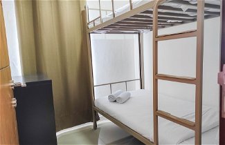 Foto 2 - Elegant 1BR Bunk Bed with Extra Queen Bed Vida View Apartment