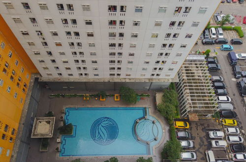 Photo 17 - Minimalist And Combine 2Br At Green Pramuka City Apartment